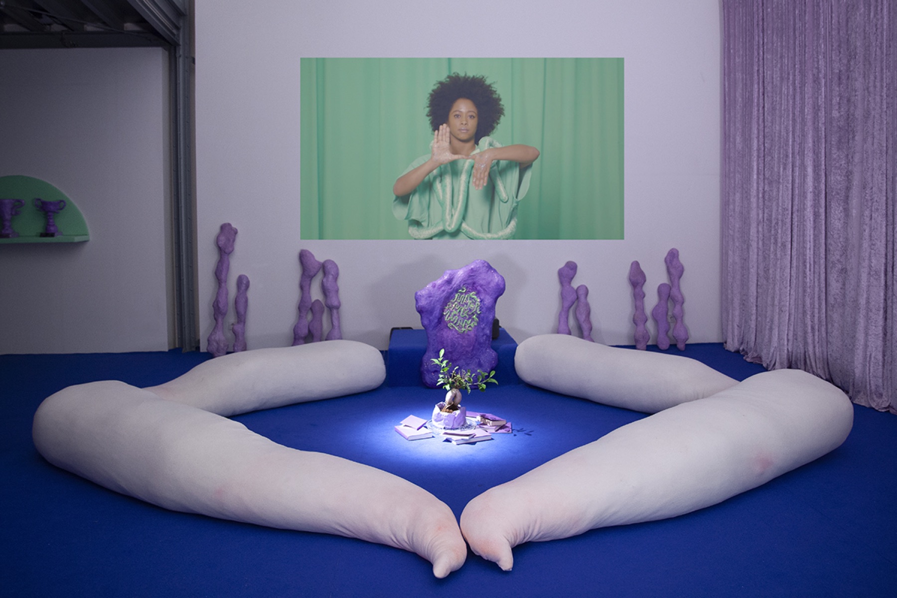 A blue-toned installation exploring radical care