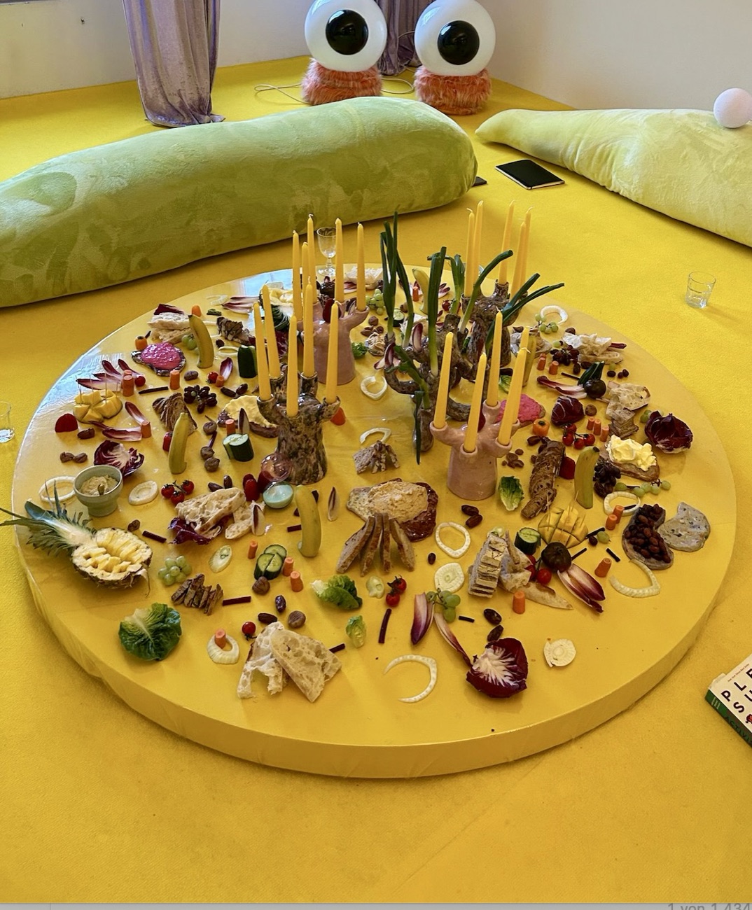 A shared yellow table laid out for a Sharing Session